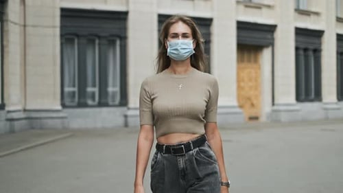 Italian Woman in Mask Walk Empty Street Coronavirus. Model Near Theater Covid-19