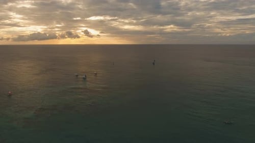 Aerial View of Boats Sailing at Sunset Ocean
