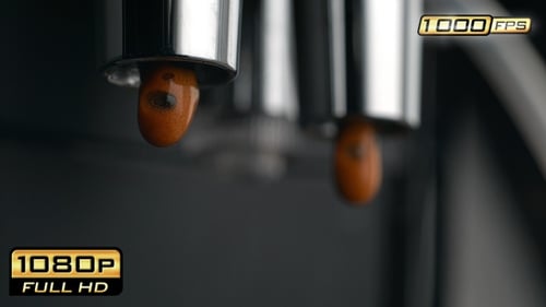 Espresso machine dispensing fresh strong coffee close-up