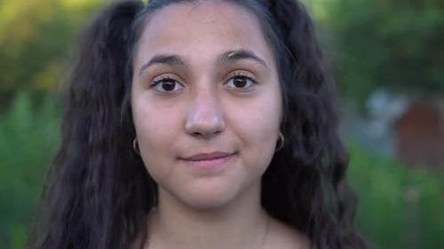 Teen Girl Smiling in Close Up Portrait
