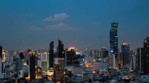 Time Lapse Night Cityscape and Highrise Buildings in Metropolis City Center