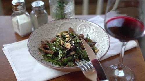 Tasty Salad and Glass of Red Wine