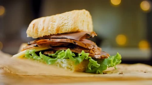 Delicious Sandwich with Ham, Lettuce, and Cheese