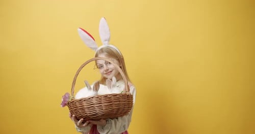 Happy Child with Easter Bunny Basket