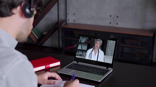 Virtual Doctor Appointment at Home on Laptop