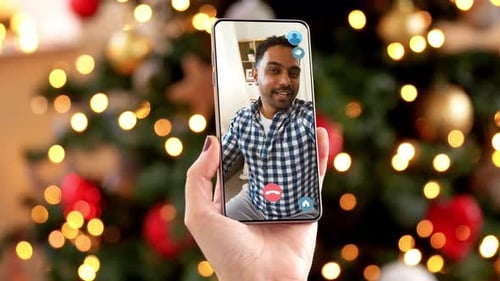 Video Call Celebration with Christmas Tree Background