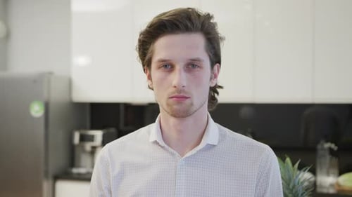 Young Man Portrait in Modern Kitchen