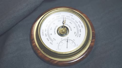 Classic Analog Barometer and Thermometer Measuring Weather Conditions