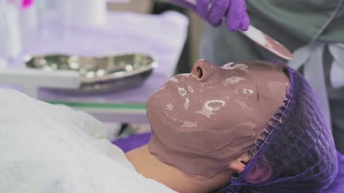 Applying Facial Mask for Skincare Beauty Treatment