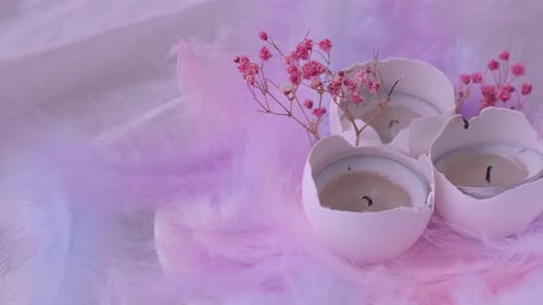 Composition of White Egg Shell with Burning Candle Inside