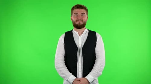 Man Talking and Pointing Side Hand for Something, with Copy Space. Green Screen