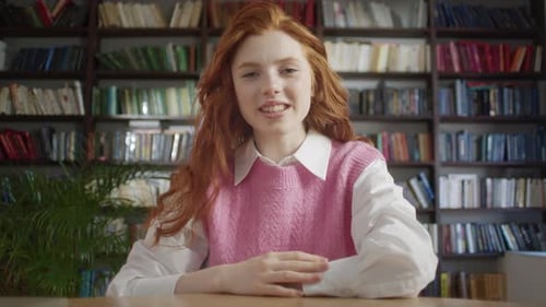 Young Woman Talking With Bookshelf Background