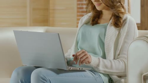Woman Working on Laptop From Home