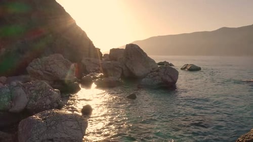 Amazing Rocks in Calm Sea Water on a Summer Day