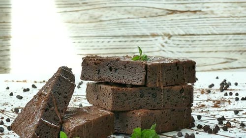 Delicious Chocolate Brownies Stacked with Mint Decoration