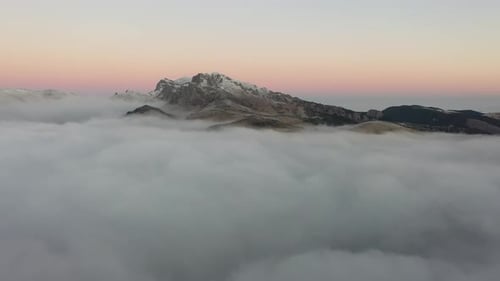 Spectacular Flight Through Clouds Over The Mountain