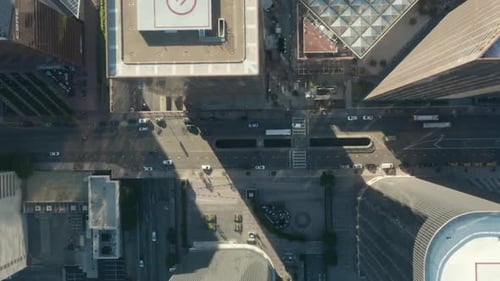 AERIAL: Slow Lowering Birds Eye View Flight Over Downtown Los Angeles California Grand Avenue in