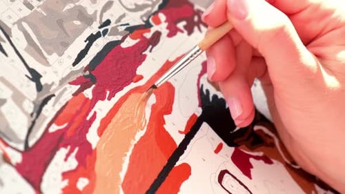 Close Up of Hand Painting on Canvas