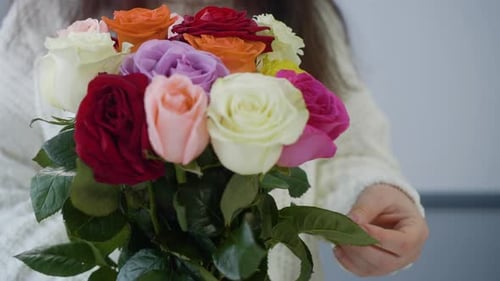 Close Up Female Hands Holding Colorful Roses Bouquet