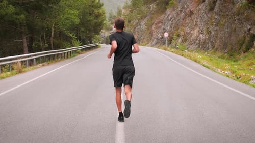 Man Running on Rural Road, Healthy Lifestyle