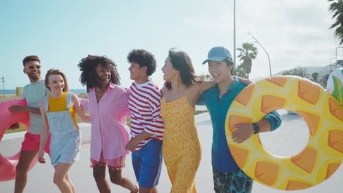 Group of friends having fun on the beach.