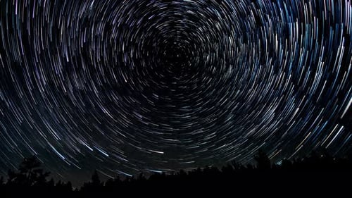 Cometshaped Star Trails in the Night Sky