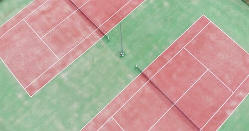 Aerial View of Tennis Courts in Urban Setting