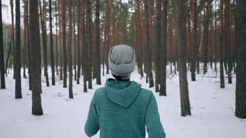 Running in Forest on Snow Track