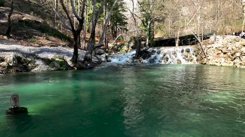 Waterfall on a mountain river aerial view