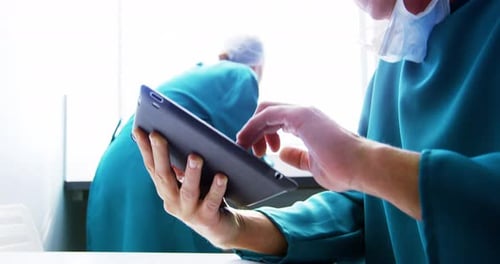 Doctor using digital tablet
