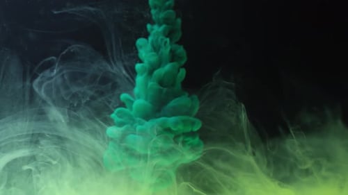 Green Ink Drop Falling in Water