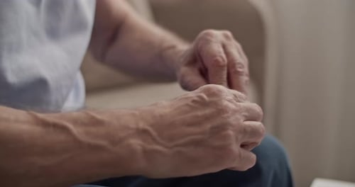 Adult opening Medicine Blister Pack into pill organizer