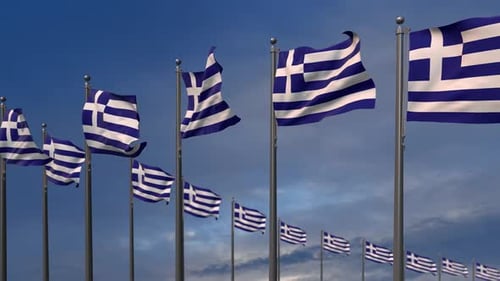 Multiple Waving Greek Flags Against a Blue Sky