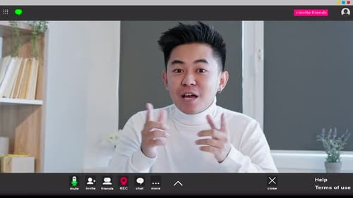 Young Adult Chatting During a Video Conference