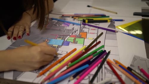 Woman Drawing Architectural Sketch with Colored Pencils