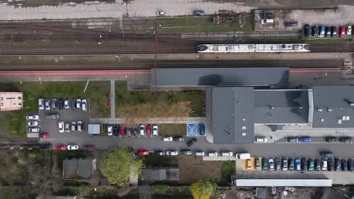 Aerial View of Railway Station with Arriving Train