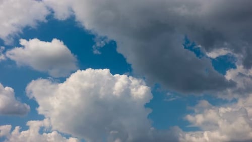 White Clouds Flowing in Blue Sky Time-Lapse