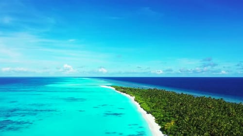 Beautiful aerial island view of a summer white paradise sand beach and blue water background in colo