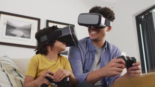 Father and Son Play VR Games Together at Home