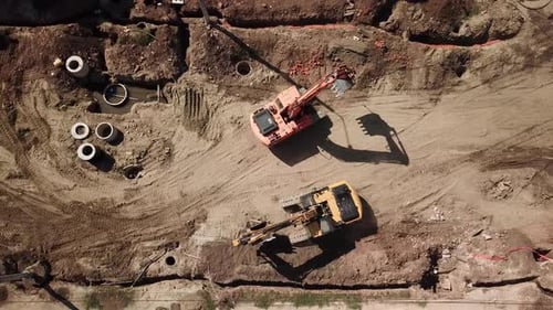 Aerial View of Construction Site with Heavy Machinery