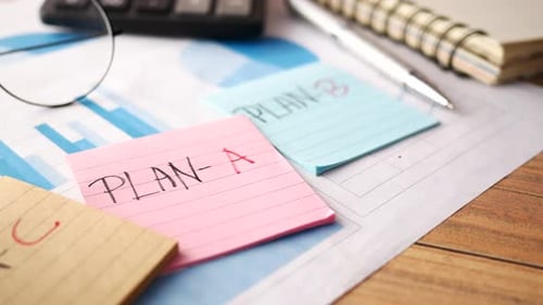 Financial Graph Calculator and Notepad on Table