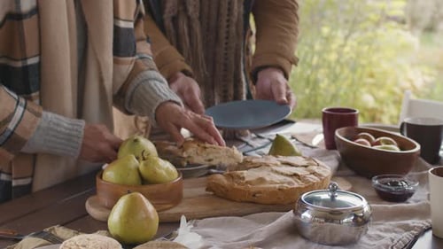 Serving Apple Pie at Autumnal Gathering