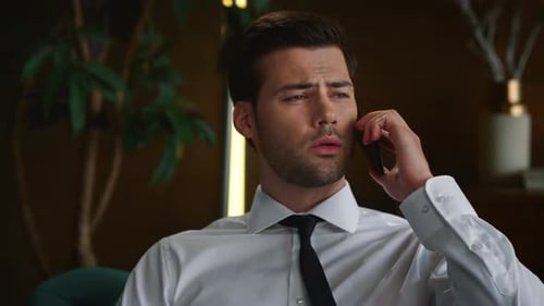 Businessman Talking on Smartphone in Office, Manager Having Phone Conversation