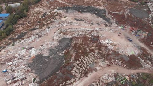 Aerial View of Overfilled Landfill in Urban Area