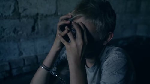 Kidnapped Man Teenager Sits Chained In Dark Chamber And Awaits Free