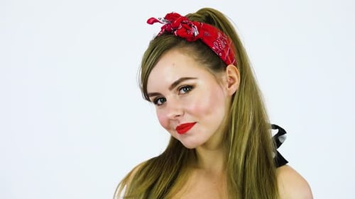 Smiling Woman with Red Bandana Posing