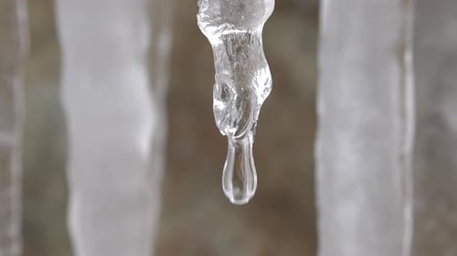 Melting Icicle Forming Water Droplet