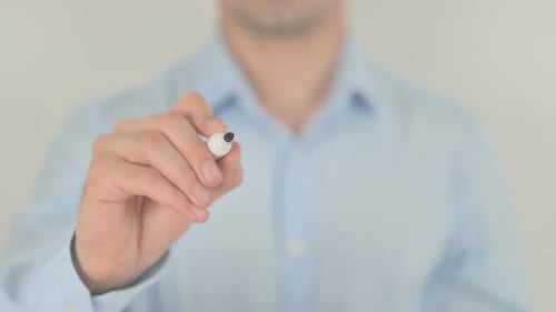 Man Writing Error on Clear Surface