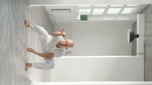 Young Choreographer Demonstrates Elements of Modern Dance on Camera