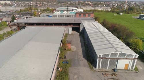 Aerial Drone view of One-storey workshops from a metal profile 10